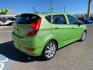 2014 Electrolyte Green Pearl /Black Hyundai Accent SE 5-Door (KMHCU5AE7EU) with an 1.6L L4 DOHC 16V engine, 5-Speed Manual transmission, located at 1865 East Red Hills Pkwy, St. George, 84770, (435) 628-0023, 37.120850, -113.543640 - Photo #5
