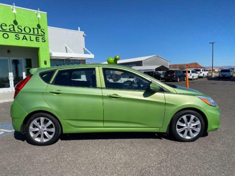 2014 Electrolyte Green Pearl /Black Hyundai Accent SE 5-Door (KMHCU5AE7EU) with an 1.6L L4 DOHC 16V engine, 5-Speed Manual transmission, located at 1865 East Red Hills Pkwy, St. George, 84770, (435) 628-0023, 37.120850, -113.543640 - Photo #7
