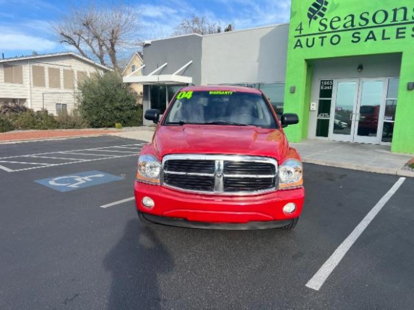 2004 Flame Red /Dark Khaki/Light Graystone Leather Interior Dodge Durango Limited 2WD (1D8HD58D14F) with an 5.7L V8 OHV 16V engine, 5-Speed Automatic transmission, located at 1865 East Red Hills Pkwy, St. George, 84770, (435) 628-0023, 37.120850, -113.543640 - Looking for a roomy, reliable SUV loaded with comfort and style? This 2004 Dodge Durango Limited is a great pick! It comes packed with leather seats, heated front seats, power sunroof, running boards, alloy wheels, towing prep package, and so much more. Whether you need it for the family or the week - Photo#1