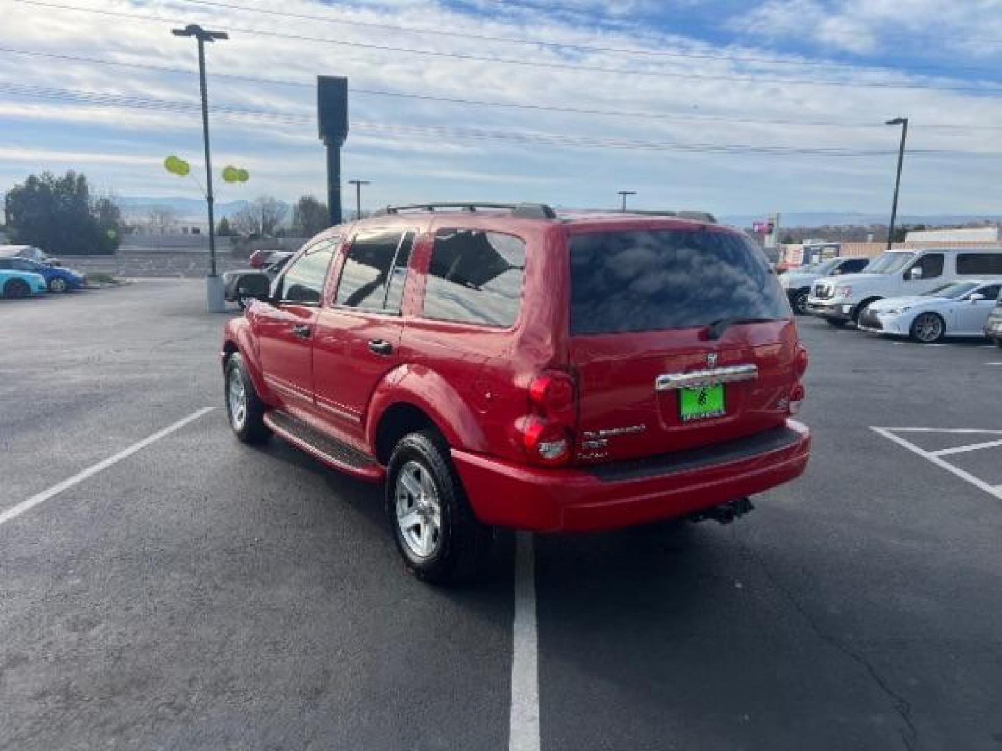 2004 Flame Red /Dark Khaki/Light Graystone Leather Interior Dodge Durango Limited 2WD (1D8HD58D14F) with an 5.7L V8 OHV 16V engine, 5-Speed Automatic transmission, located at 1865 East Red Hills Pkwy, St. George, 84770, (435) 628-0023, 37.120850, -113.543640 - Looking for a roomy, reliable SUV loaded with comfort and style? This 2004 Dodge Durango Limited is a great pick! It comes packed with leather seats, heated front seats, power sunroof, running boards, alloy wheels, towing prep package, and so much more. Whether you need it for the family or the week - Photo#4