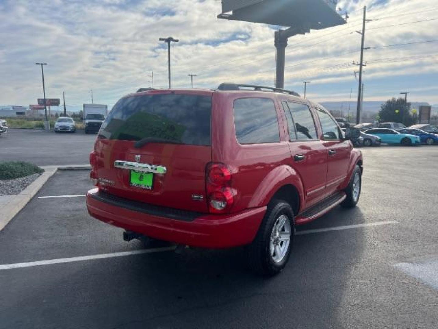 2004 Flame Red /Dark Khaki/Light Graystone Leather Interior Dodge Durango Limited 2WD (1D8HD58D14F) with an 5.7L V8 OHV 16V engine, 5-Speed Automatic transmission, located at 1865 East Red Hills Pkwy, St. George, 84770, (435) 628-0023, 37.120850, -113.543640 - Looking for a roomy, reliable SUV loaded with comfort and style? This 2004 Dodge Durango Limited is a great pick! It comes packed with leather seats, heated front seats, power sunroof, running boards, alloy wheels, towing prep package, and so much more. Whether you need it for the family or the week - Photo#6