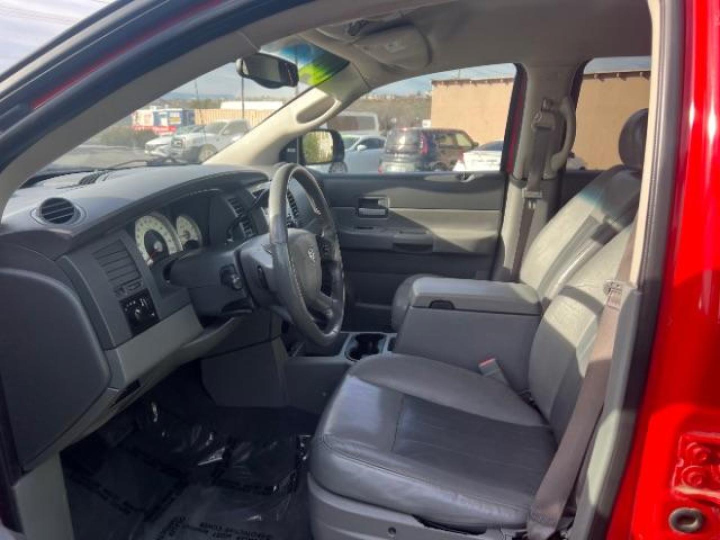 2004 Flame Red /Dark Khaki/Light Graystone Leather Interior Dodge Durango Limited 2WD (1D8HD58D14F) with an 5.7L V8 OHV 16V engine, 5-Speed Automatic transmission, located at 1865 East Red Hills Pkwy, St. George, 84770, (435) 628-0023, 37.120850, -113.543640 - Looking for a roomy, reliable SUV loaded with comfort and style? This 2004 Dodge Durango Limited is a great pick! It comes packed with leather seats, heated front seats, power sunroof, running boards, alloy wheels, towing prep package, and so much more. Whether you need it for the family or the week - Photo#14