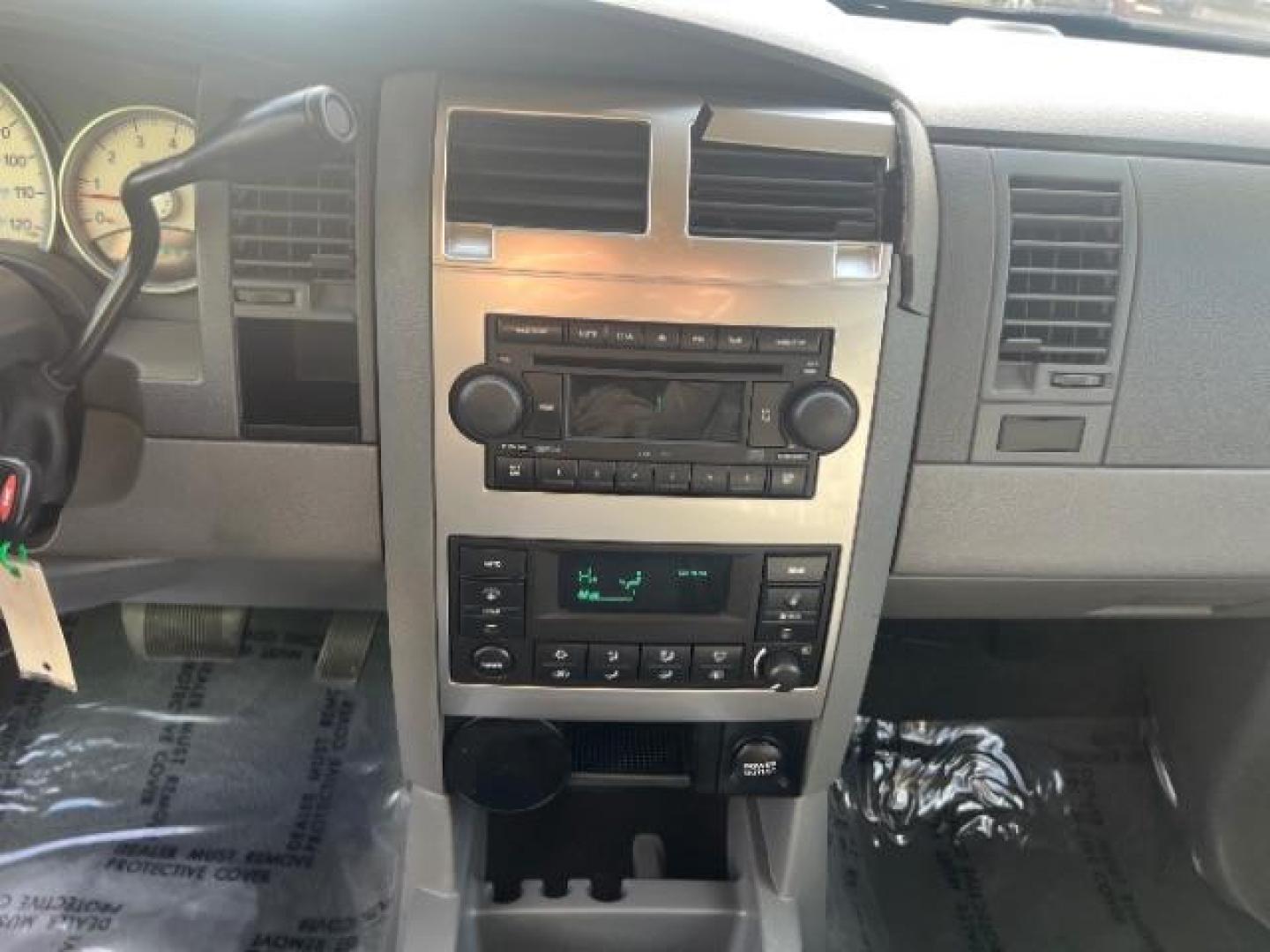 2004 Flame Red /Dark Khaki/Light Graystone Leather Interior Dodge Durango Limited 2WD (1D8HD58D14F) with an 5.7L V8 OHV 16V engine, 5-Speed Automatic transmission, located at 1865 East Red Hills Pkwy, St. George, 84770, (435) 628-0023, 37.120850, -113.543640 - Looking for a roomy, reliable SUV loaded with comfort and style? This 2004 Dodge Durango Limited is a great pick! It comes packed with leather seats, heated front seats, power sunroof, running boards, alloy wheels, towing prep package, and so much more. Whether you need it for the family or the week - Photo#17