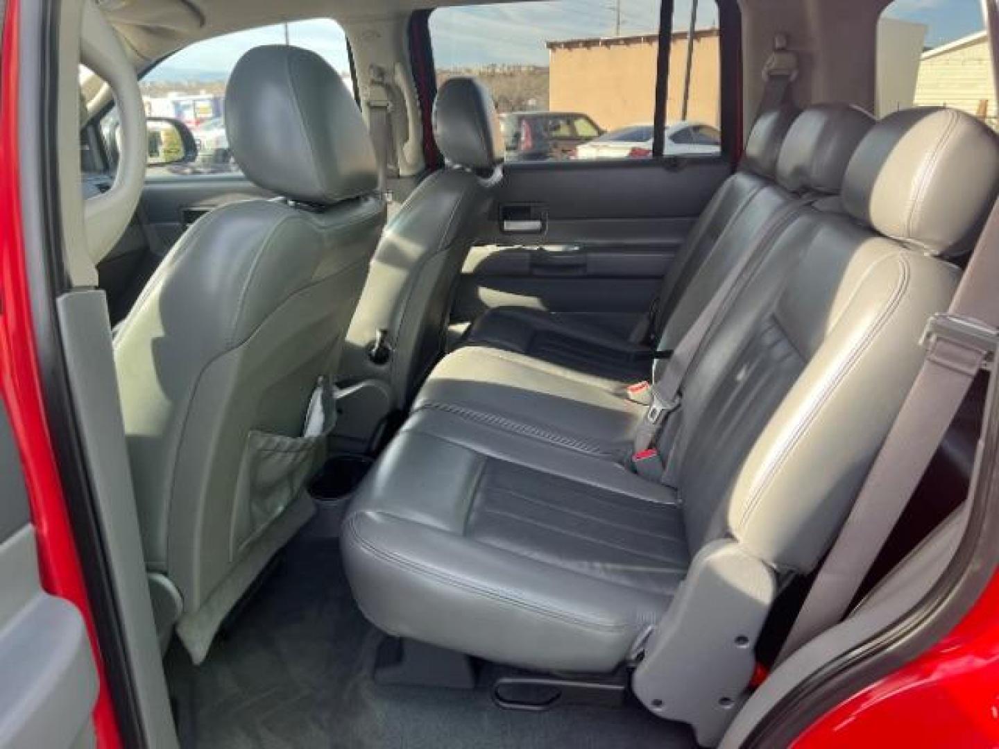 2004 Flame Red /Dark Khaki/Light Graystone Leather Interior Dodge Durango Limited 2WD (1D8HD58D14F) with an 5.7L V8 OHV 16V engine, 5-Speed Automatic transmission, located at 1865 East Red Hills Pkwy, St. George, 84770, (435) 628-0023, 37.120850, -113.543640 - Looking for a roomy, reliable SUV loaded with comfort and style? This 2004 Dodge Durango Limited is a great pick! It comes packed with leather seats, heated front seats, power sunroof, running boards, alloy wheels, towing prep package, and so much more. Whether you need it for the family or the week - Photo#21