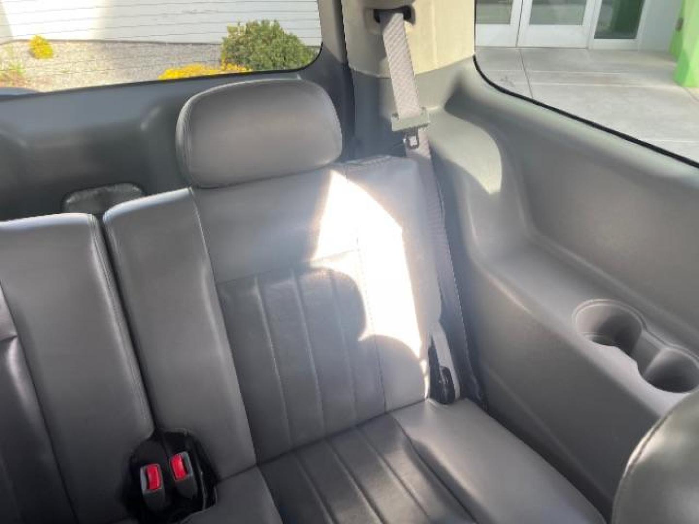 2004 Flame Red /Dark Khaki/Light Graystone Leather Interior Dodge Durango Limited 2WD (1D8HD58D14F) with an 5.7L V8 OHV 16V engine, 5-Speed Automatic transmission, located at 1865 East Red Hills Pkwy, St. George, 84770, (435) 628-0023, 37.120850, -113.543640 - Looking for a roomy, reliable SUV loaded with comfort and style? This 2004 Dodge Durango Limited is a great pick! It comes packed with leather seats, heated front seats, power sunroof, running boards, alloy wheels, towing prep package, and so much more. Whether you need it for the family or the week - Photo#27