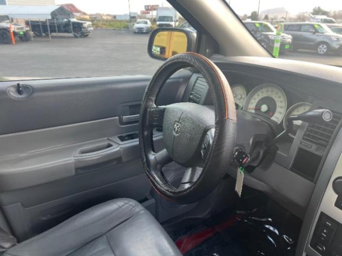 2004 Flame Red /Dark Khaki/Light Graystone Leather Interior Dodge Durango Limited 2WD (1D8HD58D14F) with an 5.7L V8 OHV 16V engine, 5-Speed Automatic transmission, located at 1865 East Red Hills Pkwy, St. George, 84770, (435) 628-0023, 37.120850, -113.543640 - Looking for a roomy, reliable SUV loaded with comfort and style? This 2004 Dodge Durango Limited is a great pick! It comes packed with leather seats, heated front seats, power sunroof, running boards, alloy wheels, towing prep package, and so much more. Whether you need it for the family or the week - Photo#34