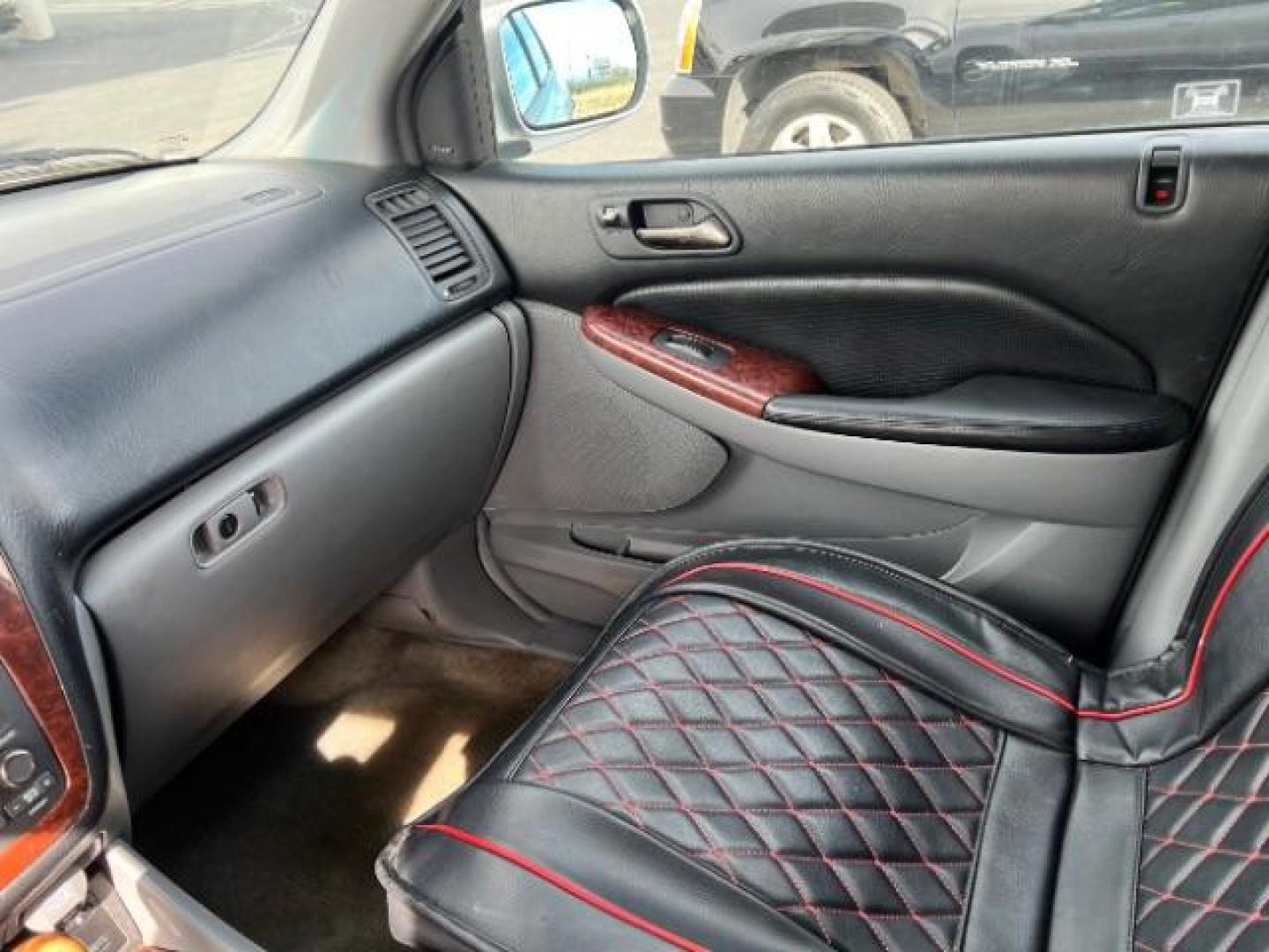 2005 Billet Silver Metall /Quartz Leather Inter Acura MDX Touring with Navigat (2HNYD18925H) with an 3.5L V6 SOHC 24V engine, 5-Speed Automatic transmission, located at 1865 East Red Hills Pkwy, St. George, 84770, (435) 628-0023, 37.120850, -113.543640 - This vehicle is a Mechanic Special. This means it will need some love. Runs a drives fine but has body damage, leaks or other mechanical issues. It did NOT pass our 50 point inspection. Get a great deal on a less than perfect car. These cars do NOT qualify for our in house financing. Cash and carry, - Photo#12