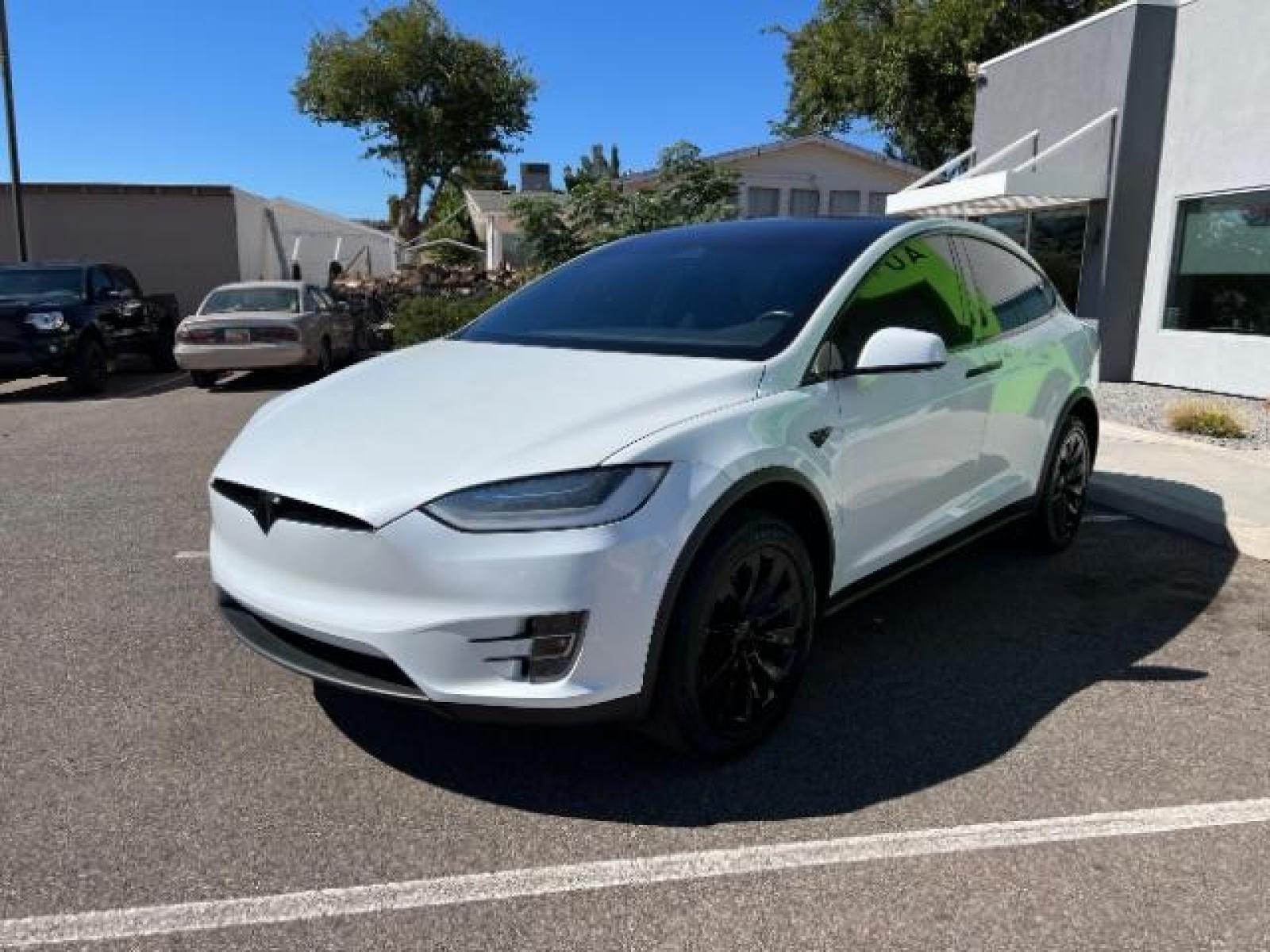 2019 Pearl White Multi-Coat /All Black, leatherette Tesla Model X Standard Range (5YJXCAE21KF) with an ELECTRIC engine, 1-Speed Automatic transmission, located at 1865 East Red Hills Pkwy, St. George, 84770, (435) 628-0023, 37.120850, -113.543640 - AWD, 7 Seats, Autopilot, Raven, Cold weather package, Adaptive suspension, Tow hitch, 2 remotes, FSD computer 3.0 upgrade. Gets 270 miles on a full charge. Black chrome delete vinyl (removeable). This is a beautiful 1 owner MX for way less money and less waiting compared to ordering from Tesla. Bump - Photo #4