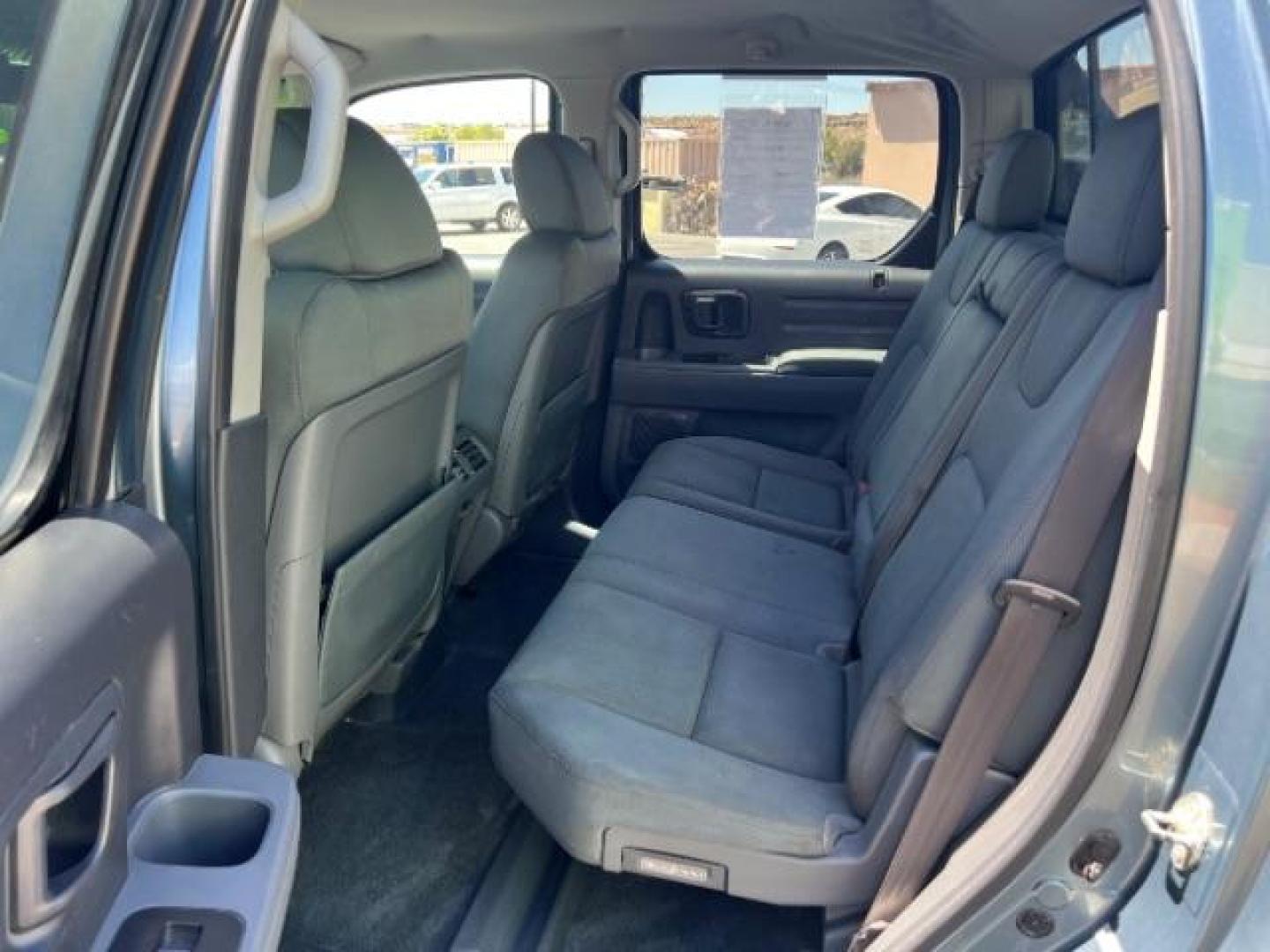 2008 Steel Blue Metallic /Gray Cloth Interior Honda Ridgeline RTX (2HJYK16368H) with an 3.5L V6 SOHC 24V engine, 5-Speed Automatic transmission, located at 940 North Main Street, Cedar City, UT, 84720, (435) 628-0023, 37.692936, -113.061897 - We specialize in helping ALL people get the best financing available. No matter your credit score, good, bad or none we can get you an amazing rate. Had a bankruptcy, divorce, or repossessions? We give you the green light to get your credit back on the road. Low down and affordable payments that fit - Photo#21