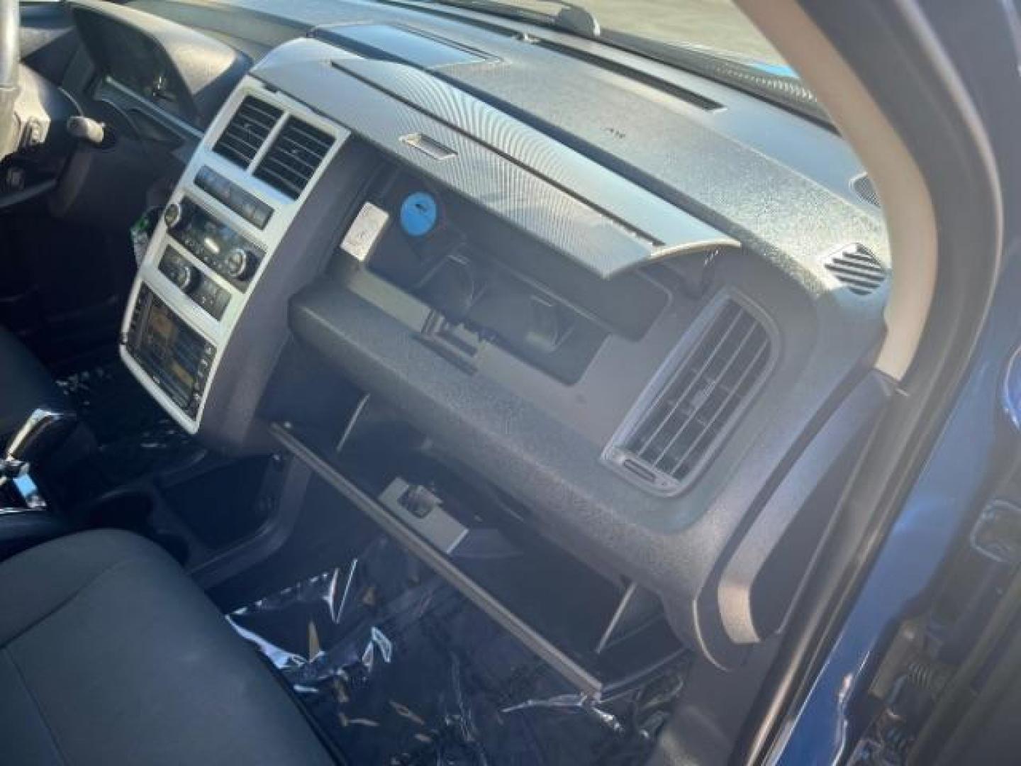 2010 Deep Water Blue /Dark Slate Gray Cloth Interior Dodge Journey SXT (3D4PG5FV7AT) with an 3.5L V6 SOHC 24V engine, 6-Speed Automatic transmission, located at 1865 East Red Hills Pkwy, St. George, 84770, (435) 628-0023, 37.120850, -113.543640 - We specialize in helping ALL people get the best financing available. No matter your credit score, good, bad or none we can get you an amazing rate. Had a bankruptcy, divorce, or repossessions? We give you the green light to get your credit back on the road. Low down and affordable payments that fit - Photo#32