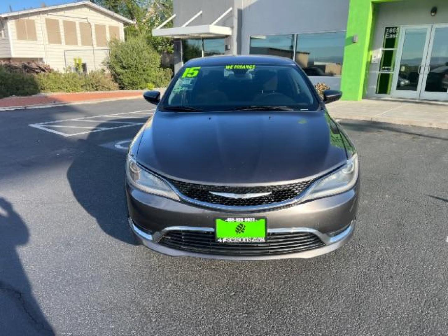 2015 Granite Crystal Met CC /Black Chrysler 200 Limited (1C3CCCAB5FN) with an 2.4L L4 DOHC 16V engine, 9-Speed Automatic transmission, located at 940 North Main Street, Cedar City, UT, 84720, (435) 628-0023, 37.692936, -113.061897 - We specialize in helping ALL people get the best financing available. No matter your credit score, good, bad or none we can get you an amazing rate. Had a bankruptcy, divorce, or repossessions? We give you the green light to get your credit back on the road. Low down and affordable payments that fit - Photo#1