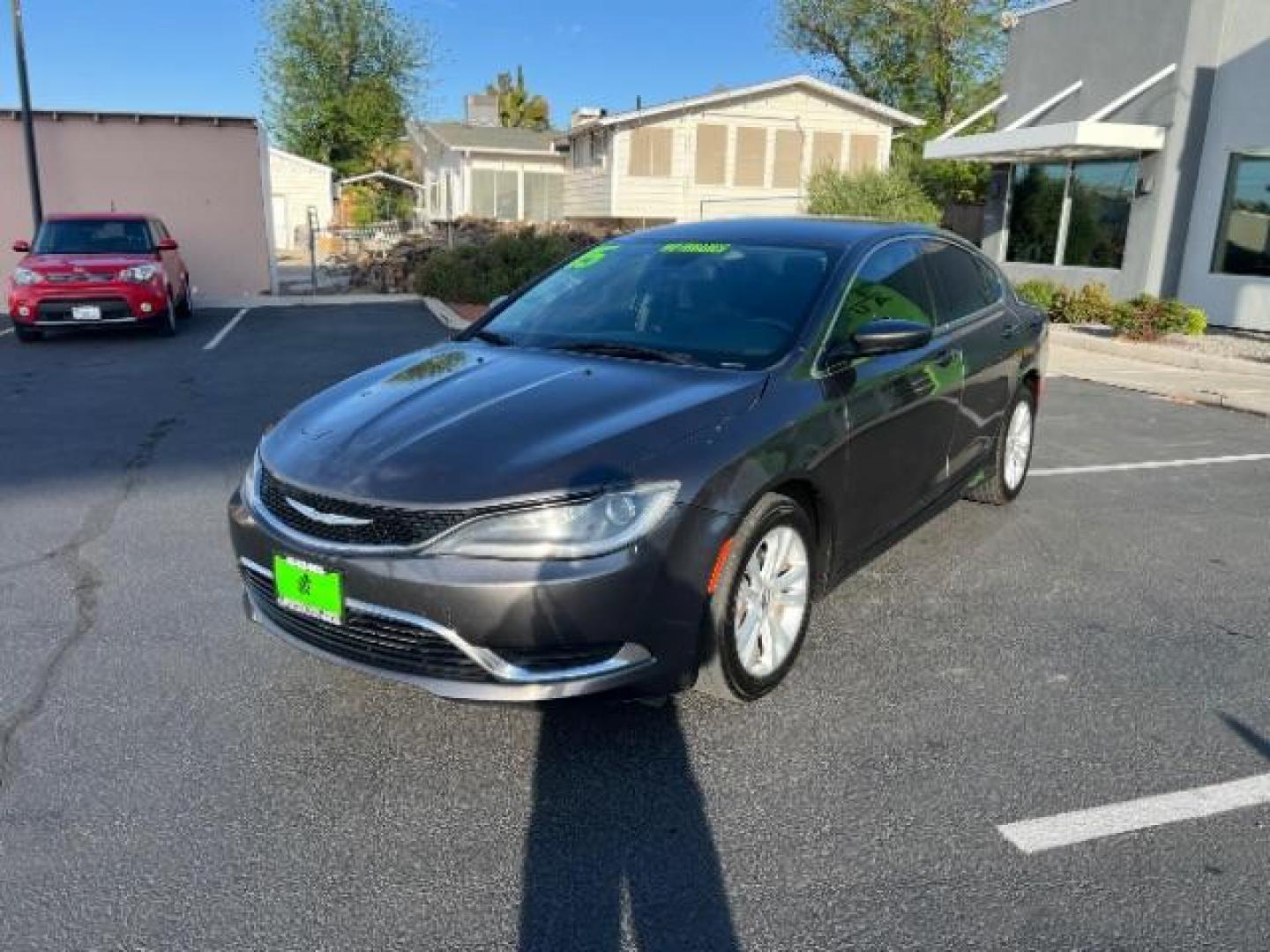 2015 Granite Crystal Met CC /Black Chrysler 200 Limited (1C3CCCAB5FN) with an 2.4L L4 DOHC 16V engine, 9-Speed Automatic transmission, located at 940 North Main Street, Cedar City, UT, 84720, (435) 628-0023, 37.692936, -113.061897 - We specialize in helping ALL people get the best financing available. No matter your credit score, good, bad or none we can get you an amazing rate. Had a bankruptcy, divorce, or repossessions? We give you the green light to get your credit back on the road. Low down and affordable payments that fit - Photo#2