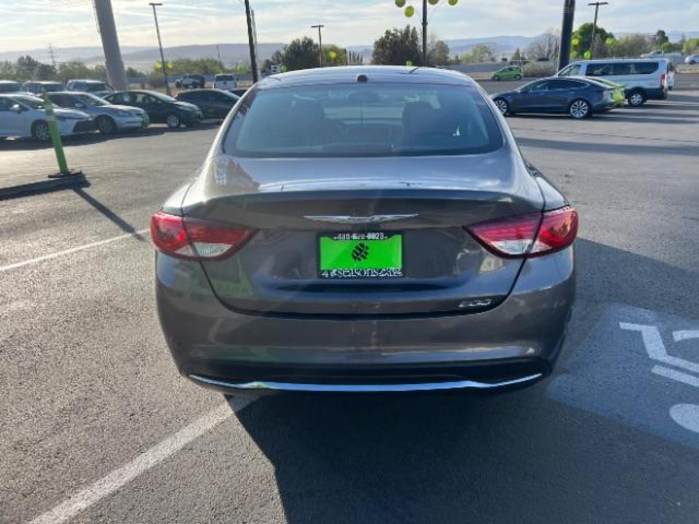 2015 Granite Crystal Met CC /Black Chrysler 200 Limited (1C3CCCAB5FN) with an 2.4L L4 DOHC 16V engine, 9-Speed Automatic transmission, located at 940 North Main Street, Cedar City, UT, 84720, (435) 628-0023, 37.692936, -113.061897 - We specialize in helping ALL people get the best financing available. No matter your credit score, good, bad or none we can get you an amazing rate. Had a bankruptcy, divorce, or repossessions? We give you the green light to get your credit back on the road. Low down and affordable payments that fit - Photo#5