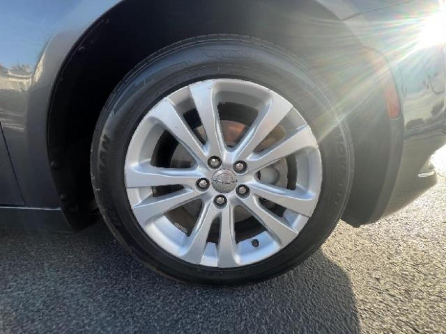 2015 Granite Crystal Met CC /Black Chrysler 200 Limited (1C3CCCAB5FN) with an 2.4L L4 DOHC 16V engine, 9-Speed Automatic transmission, located at 940 North Main Street, Cedar City, UT, 84720, (435) 628-0023, 37.692936, -113.061897 - We specialize in helping ALL people get the best financing available. No matter your credit score, good, bad or none we can get you an amazing rate. Had a bankruptcy, divorce, or repossessions? We give you the green light to get your credit back on the road. Low down and affordable payments that fit - Photo#9