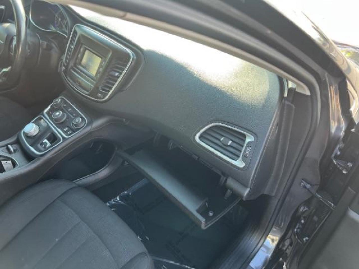 2015 Granite Crystal Met CC /Black Chrysler 200 Limited (1C3CCCAB5FN) with an 2.4L L4 DOHC 16V engine, 9-Speed Automatic transmission, located at 940 North Main Street, Cedar City, UT, 84720, (435) 628-0023, 37.692936, -113.061897 - We specialize in helping ALL people get the best financing available. No matter your credit score, good, bad or none we can get you an amazing rate. Had a bankruptcy, divorce, or repossessions? We give you the green light to get your credit back on the road. Low down and affordable payments that fit - Photo#29