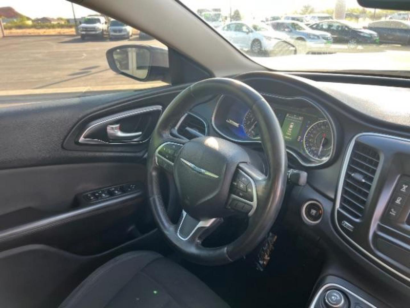 2015 Granite Crystal Met CC /Black Chrysler 200 Limited (1C3CCCAB5FN) with an 2.4L L4 DOHC 16V engine, 9-Speed Automatic transmission, located at 940 North Main Street, Cedar City, UT, 84720, (435) 628-0023, 37.692936, -113.061897 - We specialize in helping ALL people get the best financing available. No matter your credit score, good, bad or none we can get you an amazing rate. Had a bankruptcy, divorce, or repossessions? We give you the green light to get your credit back on the road. Low down and affordable payments that fit - Photo#30