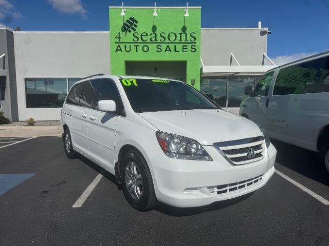 2007 Taffeta White /Ivory Leather Interior Honda Odyssey EX-L w/ DVD (5FNRL38717B) with an 3.5L V6 SOHC 24V engine, 5-Speed Automatic transmission, located at 1865 East Red Hills Pkwy, St. George, 84770, (435) 628-0023, 37.120850, -113.543640 - Photo#0