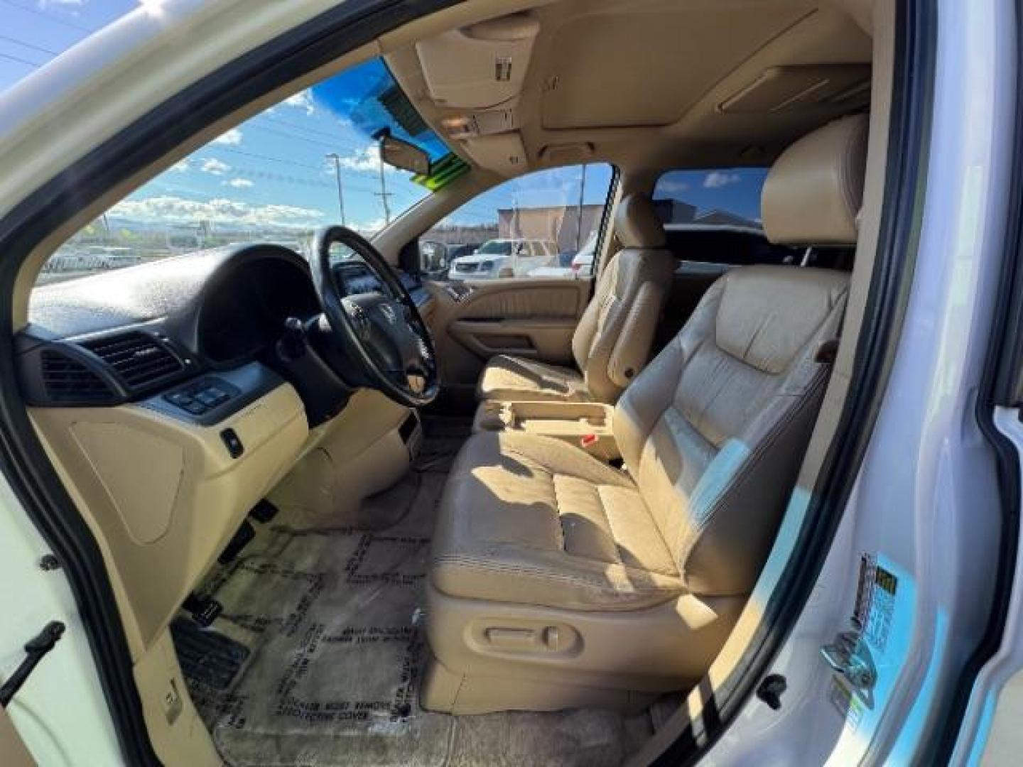 2007 Taffeta White /Ivory Leather Interior Honda Odyssey EX-L w/ DVD (5FNRL38717B) with an 3.5L V6 SOHC 24V engine, 5-Speed Automatic transmission, located at 1865 East Red Hills Pkwy, St. George, 84770, (435) 628-0023, 37.120850, -113.543640 - Photo#10