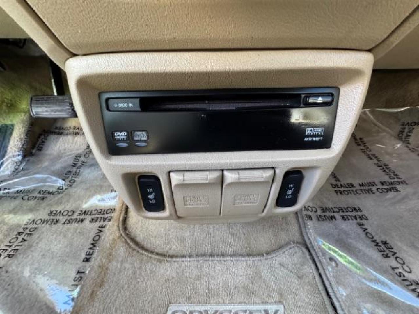 2007 Taffeta White /Ivory Leather Interior Honda Odyssey EX-L w/ DVD (5FNRL38717B) with an 3.5L V6 SOHC 24V engine, 5-Speed Automatic transmission, located at 1865 East Red Hills Pkwy, St. George, 84770, (435) 628-0023, 37.120850, -113.543640 - Photo#16