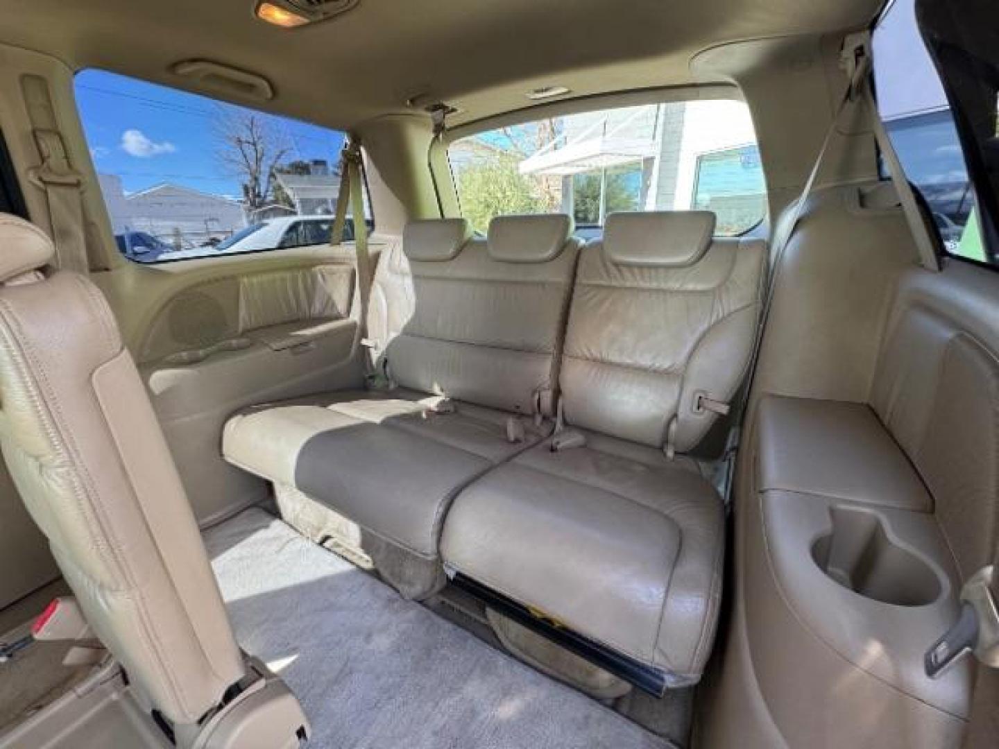 2007 Taffeta White /Ivory Leather Interior Honda Odyssey EX-L w/ DVD (5FNRL38717B) with an 3.5L V6 SOHC 24V engine, 5-Speed Automatic transmission, located at 1865 East Red Hills Pkwy, St. George, 84770, (435) 628-0023, 37.120850, -113.543640 - Photo#19