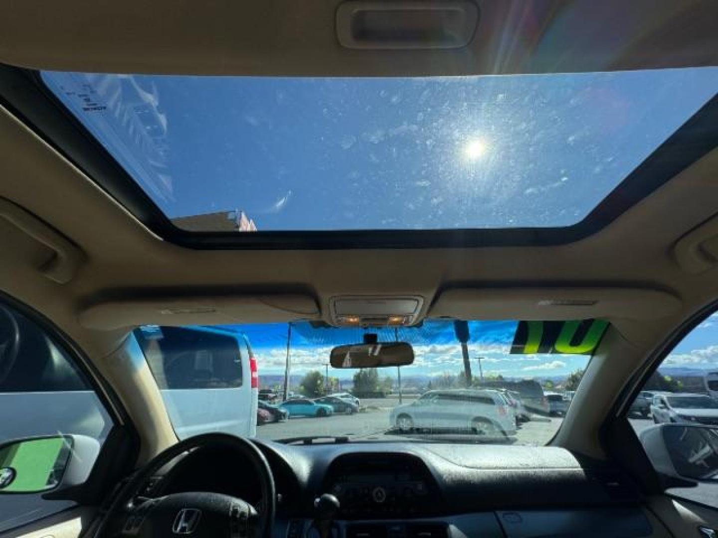 2007 Taffeta White /Ivory Leather Interior Honda Odyssey EX-L w/ DVD (5FNRL38717B) with an 3.5L V6 SOHC 24V engine, 5-Speed Automatic transmission, located at 1865 East Red Hills Pkwy, St. George, 84770, (435) 628-0023, 37.120850, -113.543640 - Photo#21