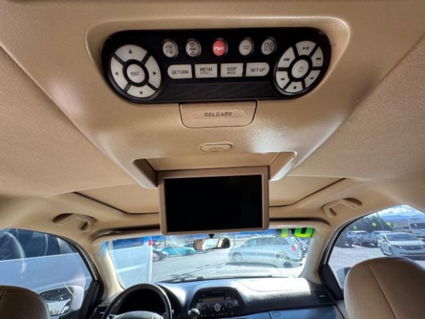 2007 Taffeta White /Ivory Leather Interior Honda Odyssey EX-L w/ DVD (5FNRL38717B) with an 3.5L V6 SOHC 24V engine, 5-Speed Automatic transmission, located at 1865 East Red Hills Pkwy, St. George, 84770, (435) 628-0023, 37.120850, -113.543640 - Photo#23