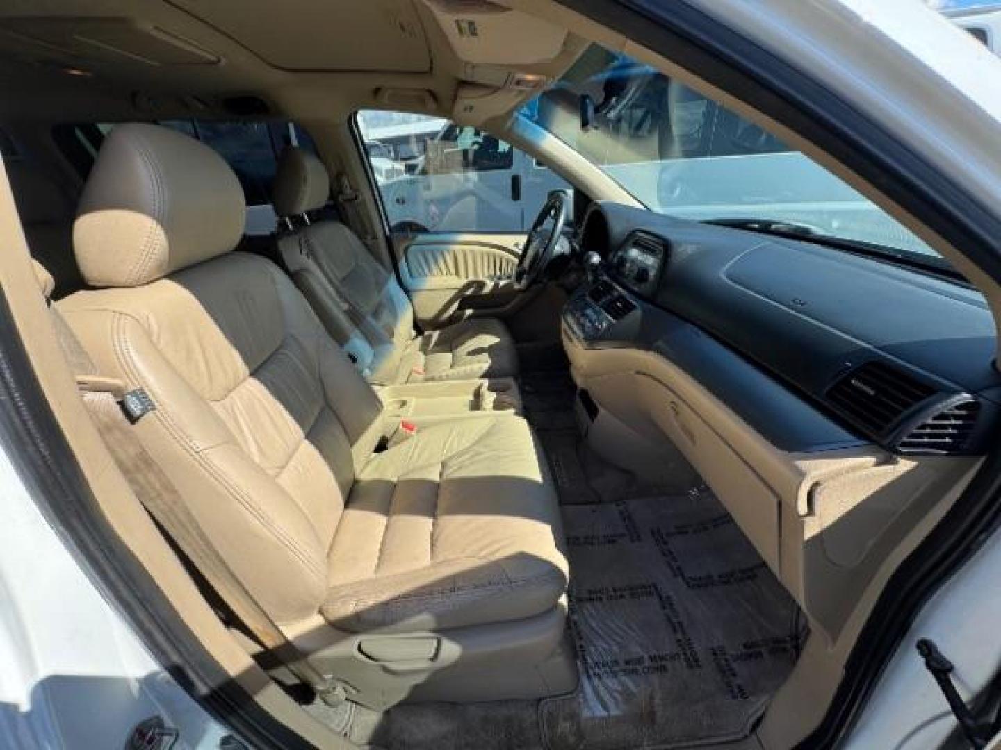 2007 Taffeta White /Ivory Leather Interior Honda Odyssey EX-L w/ DVD (5FNRL38717B) with an 3.5L V6 SOHC 24V engine, 5-Speed Automatic transmission, located at 1865 East Red Hills Pkwy, St. George, 84770, (435) 628-0023, 37.120850, -113.543640 - Photo#26
