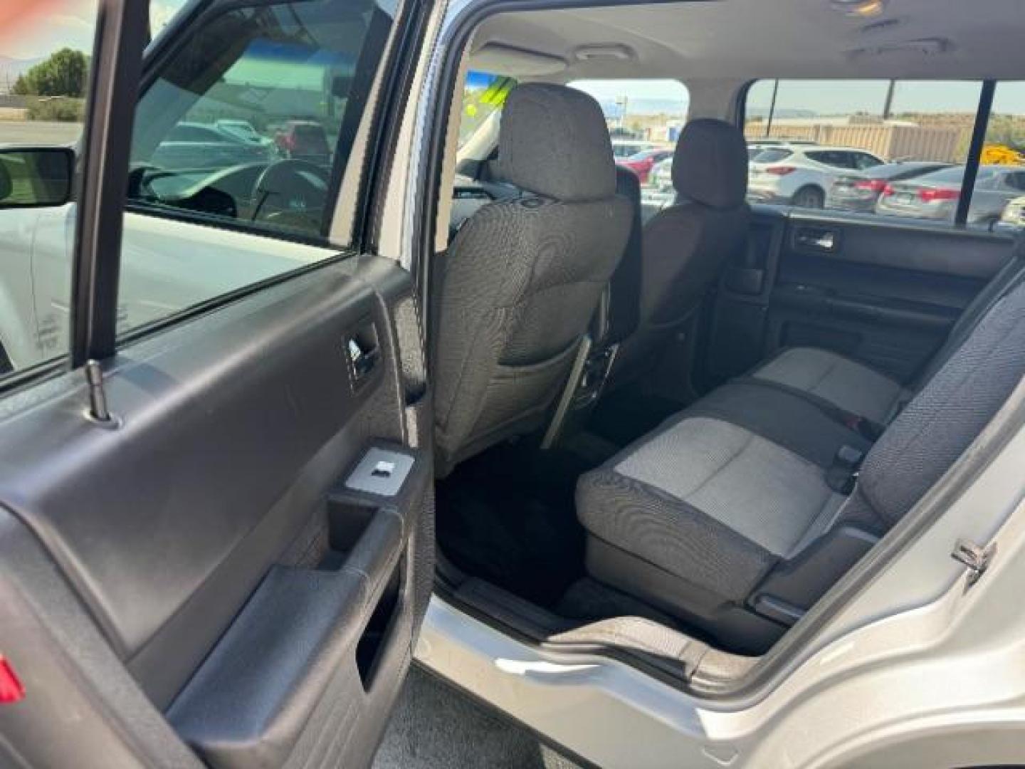 2011 Ingot Silver Metalli /Charcoal Black Cloth Ford Flex SE FWD (2FMGK5BC4BB) with an 3.5L V6 DOHC 24V engine, 6-Speed Automatic Ov transmission, located at 1865 East Red Hills Pkwy, St. George, 84770, (435) 628-0023, 37.120850, -113.543640 - We specialize in helping ALL people get the best financing available. No matter your credit score, good, bad or none we can get you an amazing rate. Had a bankruptcy, divorce, or repossessions? We give you the green light to get your credit back on the road. Low down and affordable payments that fit - Photo#22