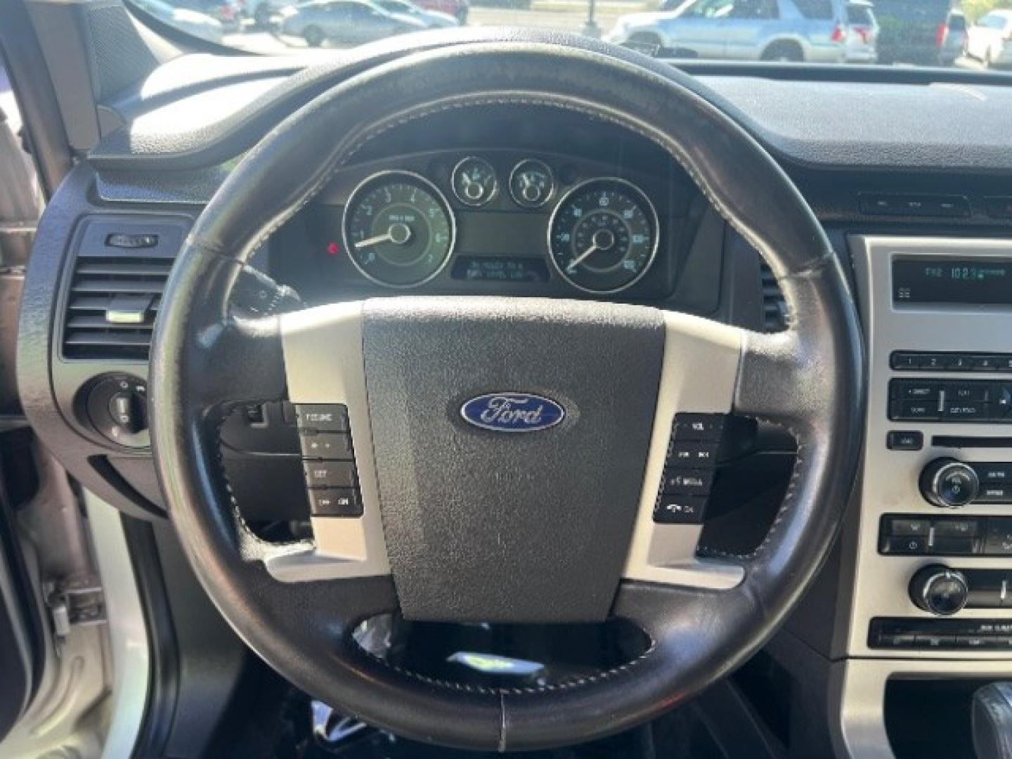 2011 Ingot Silver Metallic /Medium Light Stone Cloth Interior Ford Flex SE FWD (2FMGK5BC4BB) with an 3.5L V6 DOHC 24V engine, 6-Speed Automatic Overdrive transmission, located at 1865 East Red Hills Pkwy, St. George, 84770, (435) 628-0023, 37.120850, -113.543640 - Need three-row space on a budget? This Ingot Silver 2011 Ford Flex SE FWD brings a 3.5L V6, 6-speed automatic, and front-wheel drive - the unique Flex layout families still love around Southern Utah. We specialize in in-house financing and work with all credit types - good, fair, challenged, or reb- Photo#15