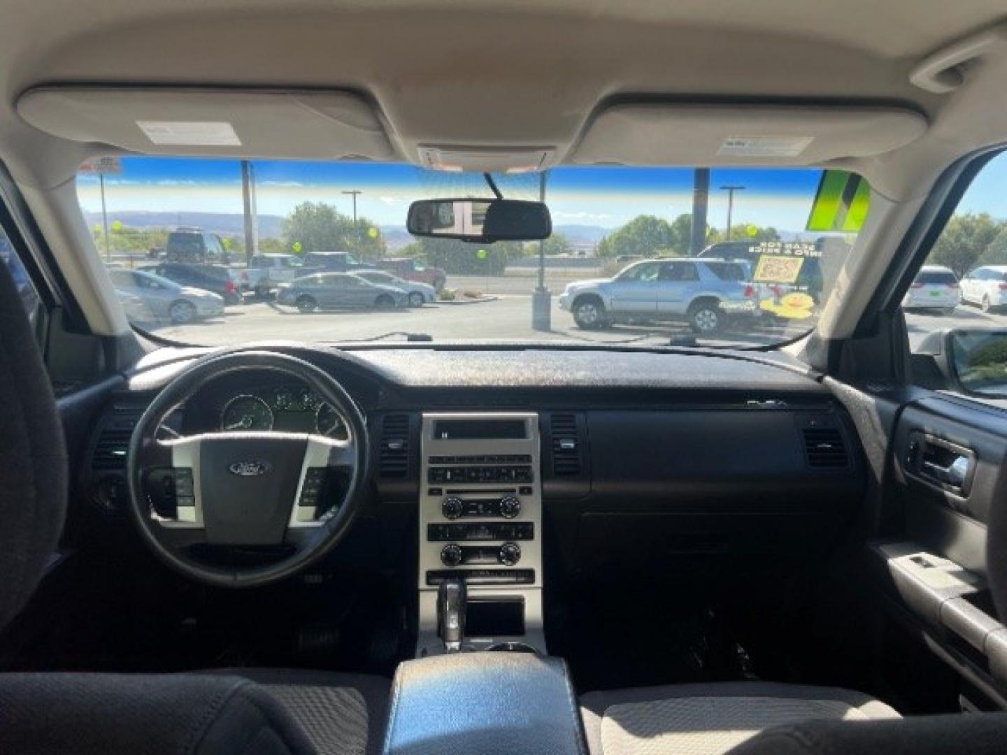 2011 Ingot Silver Metallic /Medium Light Stone Cloth Interior Ford Flex SE FWD (2FMGK5BC4BB) with an 3.5L V6 DOHC 24V engine, 6-Speed Automatic Overdrive transmission, located at 1865 East Red Hills Pkwy, St. George, 84770, (435) 628-0023, 37.120850, -113.543640 - Need three-row space on a budget? This Ingot Silver 2011 Ford Flex SE FWD brings a 3.5L V6, 6-speed automatic, and front-wheel drive - the unique Flex layout families still love around Southern Utah. We specialize in in-house financing and work with all credit types - good, fair, challenged, or reb- Photo#22