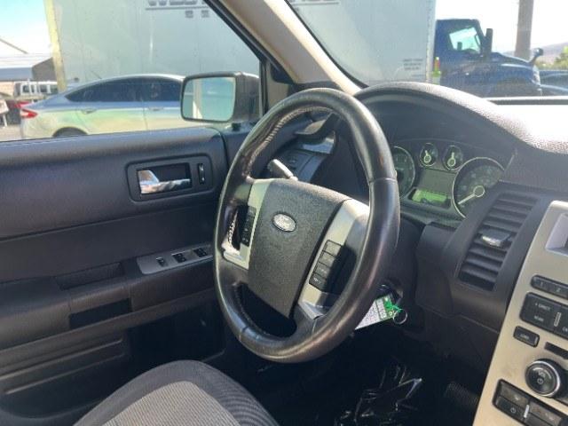2011 Ingot Silver Metallic /Medium Light Stone Cloth Interior Ford Flex SE FWD (2FMGK5BC4BB) with an 3.5L V6 DOHC 24V engine, 6-Speed Automatic Overdrive transmission, located at 1865 East Red Hills Pkwy, St. George, 84770, (435) 628-0023, 37.120850, -113.543640- Photo#32
