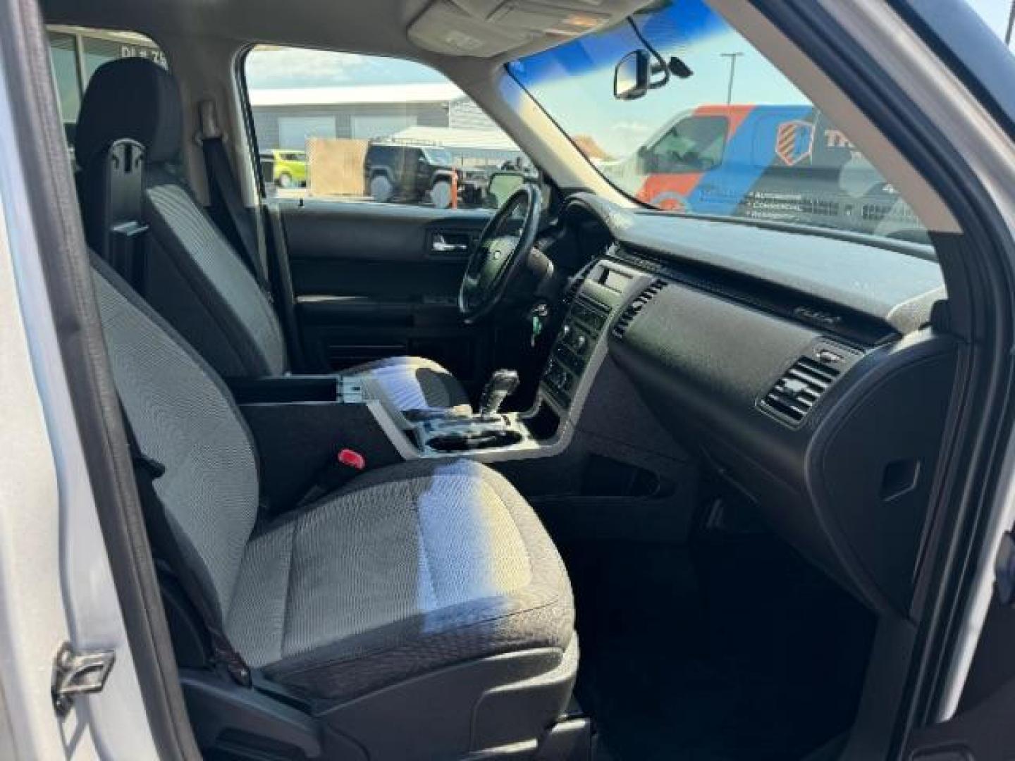 2011 Ingot Silver Metalli /Charcoal Black Cloth Ford Flex SE FWD (2FMGK5BC4BB) with an 3.5L V6 DOHC 24V engine, 6-Speed Automatic Ov transmission, located at 1865 East Red Hills Pkwy, St. George, 84770, (435) 628-0023, 37.120850, -113.543640 - We specialize in helping ALL people get the best financing available. No matter your credit score, good, bad or none we can get you an amazing rate. Had a bankruptcy, divorce, or repossessions? We give you the green light to get your credit back on the road. Low down and affordable payments that fit - Photo#33