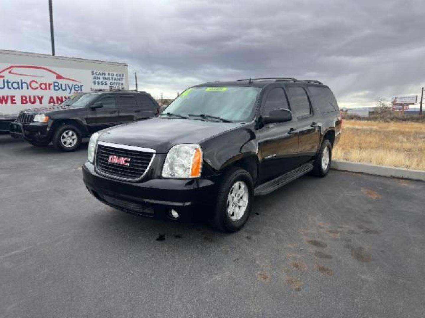 2014 Onyx Black /Light Titanium GMC Yukon XL SLT 1/2 Ton 2WD (1GKS1KE08ER) with an 5.3L V8 OHV 16V FFV engine, 6-Speed Automatic transmission, located at 1865 East Red Hills Pkwy, St. George, 84770, (435) 628-0023, 37.120850, -113.543640 - This vehicle is a Mechanic Special. This means it will need some love. Runs a drives fine but has body damage, leaks or other mechanical issues. It did NOT pass our 50 point inspection. Get a great deal on a less than perfect car. These cars do NOT qualify for our in house financing. Cash and carry, - Photo#2