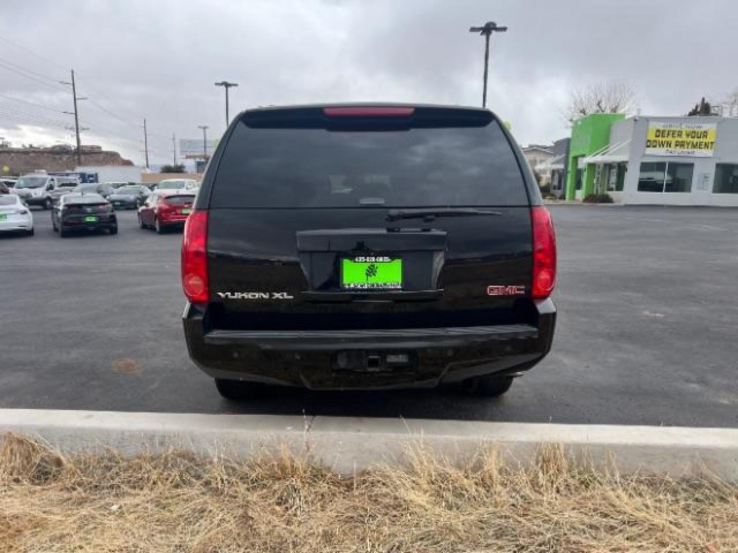 2014 Onyx Black /Light Titanium GMC Yukon XL SLT 1/2 Ton 2WD (1GKS1KE08ER) with an 5.3L V8 OHV 16V FFV engine, 6-Speed Automatic transmission, located at 1865 East Red Hills Pkwy, St. George, 84770, (435) 628-0023, 37.120850, -113.543640 - This vehicle is a Mechanic Special. This means it will need some love. Runs a drives fine but has body damage, leaks or other mechanical issues. It did NOT pass our 50 point inspection. Get a great deal on a less than perfect car. These cars do NOT qualify for our in house financing. Cash and carry, - Photo#5