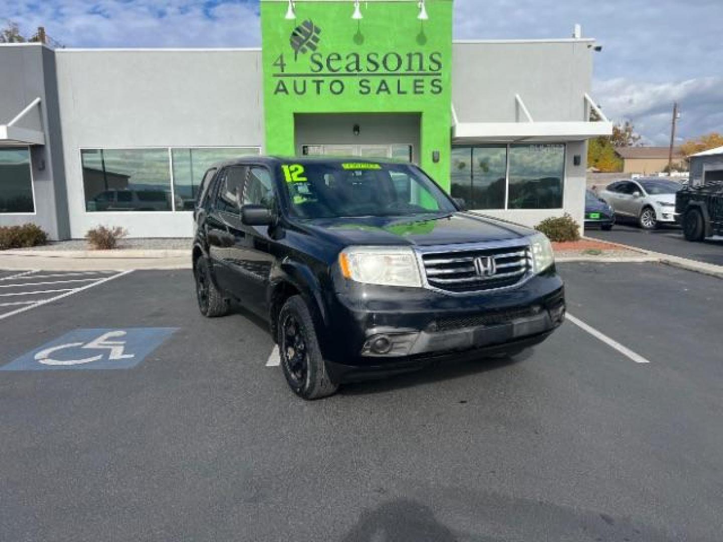 2012 Crystal Black Pearl /Gray Cloth Interior Honda Pilot LX 2WD 5-Spd AT (5FNYF3H27CB) with an 3.5L V6 SOHC 24V engine, 5-Speed Automatic transmission, located at 1865 East Red Hills Pkwy, St. George, 84770, (435) 628-0023, 37.120850, -113.543640 - We specialize in helping ALL people get the best financing available. No matter your credit score, good, bad or none we can get you an amazing rate. Had a bankruptcy, divorce, or repossessions? We give you the green light to get your credit back on the road. Low down and affordable payments that fit - Photo#0