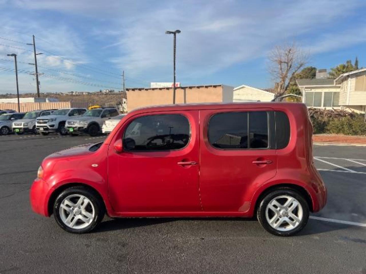 2010 Scarlet Red Metallic /Black Cloth Interior Nissan cube 1.8 SL (JN8AZ2KR1AT) with an 1.8L L4 DOHC 16V engine, Continuously Variabl transmission, located at 940 North Main Street, Cedar City, UT, 84720, (435) 628-0023, 37.692936, -113.061897 - We specialize in helping ALL people get the best financing available. No matter your credit score, good, bad or none we can get you an amazing rate. Had a bankruptcy, divorce, or repossessions? We give you the green light to get your credit back on the road. Low down and affordable payments that fit - Photo#3