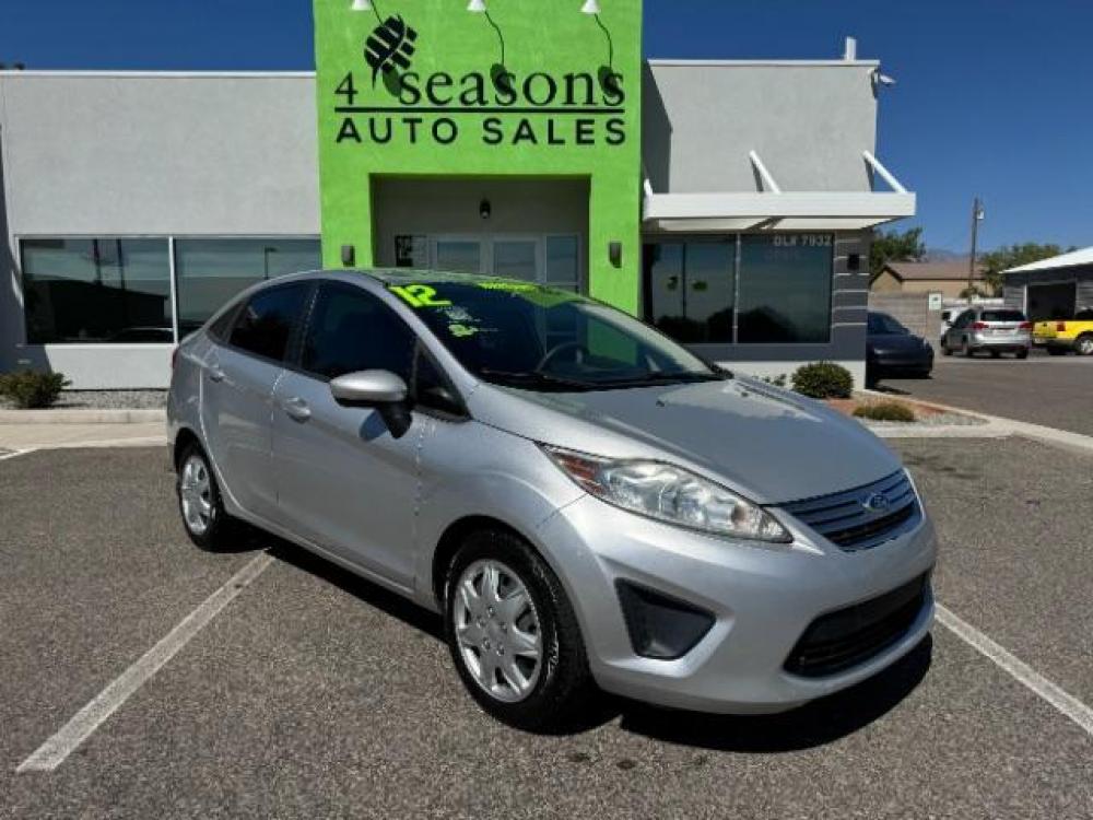 2012 Ingot Silver Metallic /Charcoal Black Cloth Interior Ford Fiesta SE Sedan (3FADP4BJ2CM) with an 1.6L L4 DOHC 16V engine, 6-Speed Automatic transmission, located at 1865 East Red Hills Pkwy, St. George, 84770, (435) 628-0023, 37.120850, -113.543640 - We specialize in helping ALL people get the best financing available. No matter your credit score, good, bad or none we can get you an amazing rate. Had a bankruptcy, divorce, or repossessions? We give you the green light to get your credit back on the road. Low down and affordable payments that fit - Photo #0