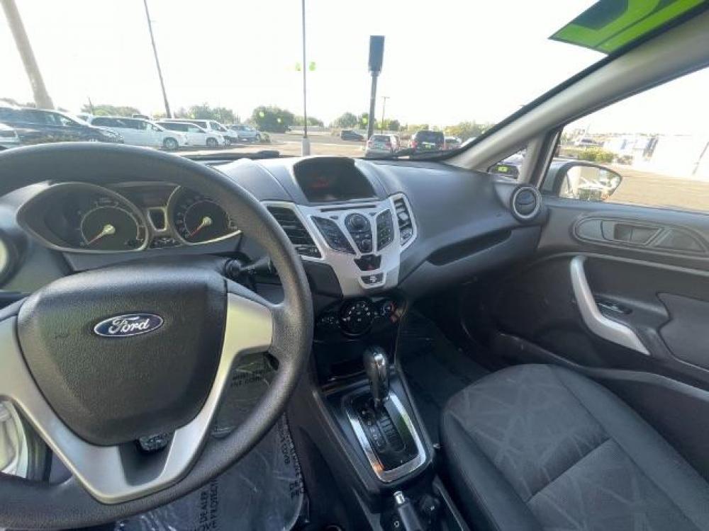 2012 Ingot Silver Metallic /Charcoal Black Cloth Interior Ford Fiesta SE Sedan (3FADP4BJ2CM) with an 1.6L L4 DOHC 16V engine, 6-Speed Automatic transmission, located at 1865 East Red Hills Pkwy, St. George, 84770, (435) 628-0023, 37.120850, -113.543640 - We specialize in helping ALL people get the best financing available. No matter your credit score, good, bad or none we can get you an amazing rate. Had a bankruptcy, divorce, or repossessions? We give you the green light to get your credit back on the road. Low down and affordable payments that fit - Photo #9