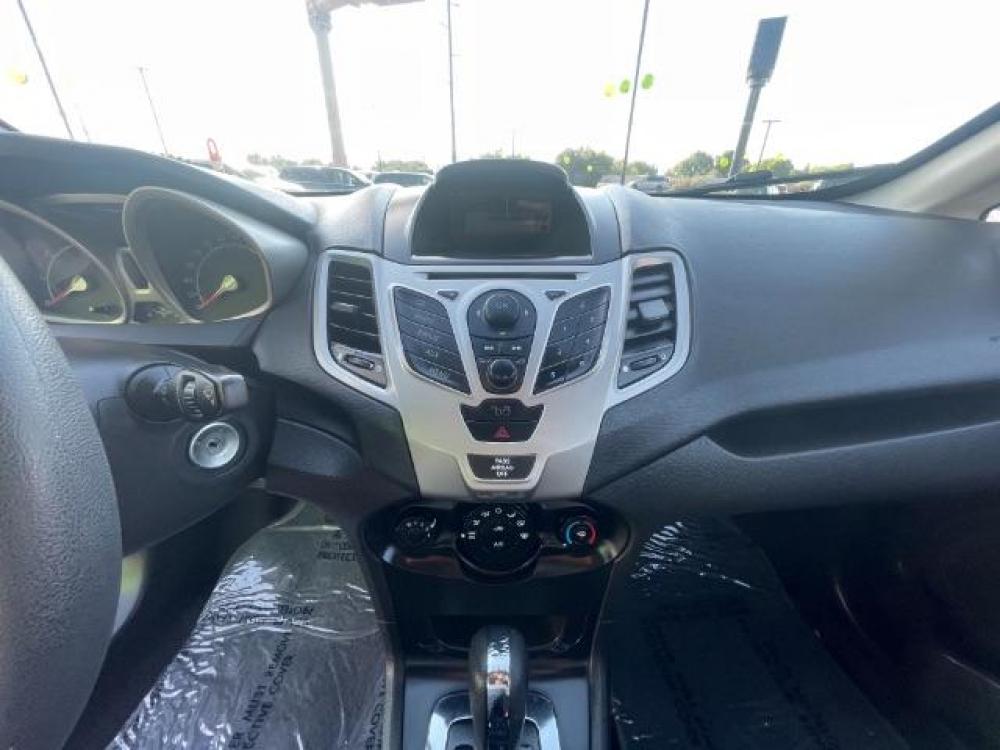 2012 Ingot Silver Metallic /Charcoal Black Cloth Interior Ford Fiesta SE Sedan (3FADP4BJ2CM) with an 1.6L L4 DOHC 16V engine, 6-Speed Automatic transmission, located at 1865 East Red Hills Pkwy, St. George, 84770, (435) 628-0023, 37.120850, -113.543640 - We specialize in helping ALL people get the best financing available. No matter your credit score, good, bad or none we can get you an amazing rate. Had a bankruptcy, divorce, or repossessions? We give you the green light to get your credit back on the road. Low down and affordable payments that fit - Photo #18