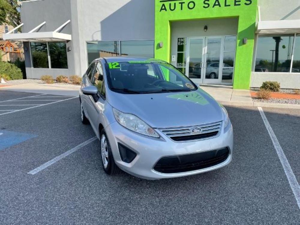 2012 Ingot Silver Metallic /Charcoal Black Cloth Interior Ford Fiesta SE Sedan (3FADP4BJ2CM) with an 1.6L L4 DOHC 16V engine, 6-Speed Automatic transmission, located at 1865 East Red Hills Pkwy, St. George, 84770, (435) 628-0023, 37.120850, -113.543640 - We specialize in helping ALL people get the best financing available. No matter your credit score, good, bad or none we can get you an amazing rate. Had a bankruptcy, divorce, or repossessions? We give you the green light to get your credit back on the road. Low down and affordable payments that fit - Photo #1