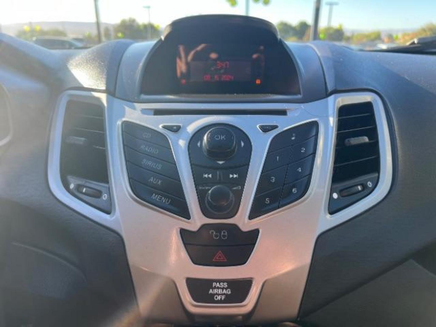 2012 Ingot Silver Metalli /Charcoal Black Cloth Ford Fiesta SE Sedan (3FADP4BJ2CM) with an 1.6L L4 DOHC 16V engine, 6-Speed Automatic transmission, located at 940 North Main Street, Cedar City, UT, 84720, (435) 628-0023, 37.692936, -113.061897 - Photo#17