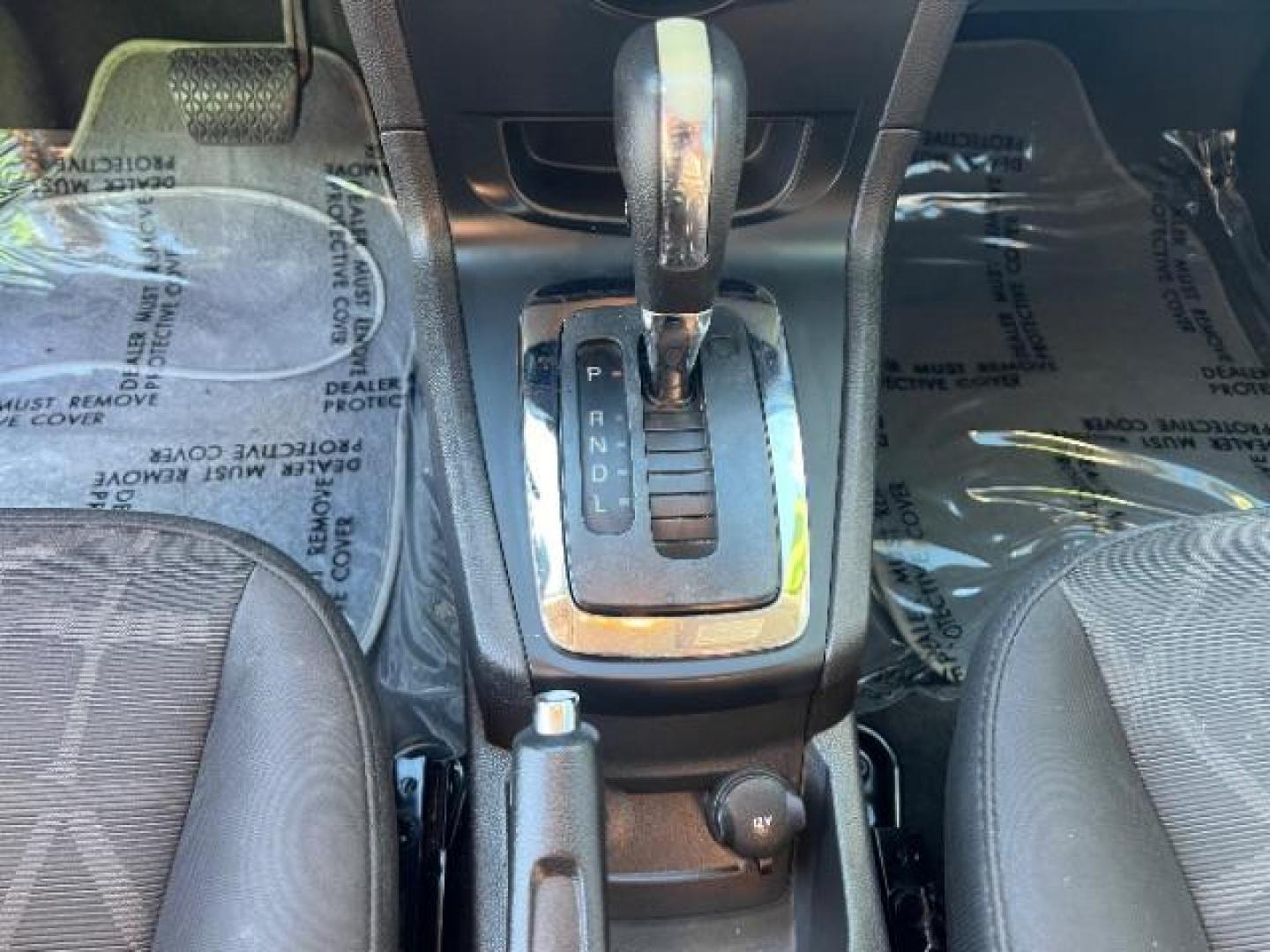 2012 Ingot Silver Metalli /Charcoal Black Cloth Ford Fiesta SE Sedan (3FADP4BJ2CM) with an 1.6L L4 DOHC 16V engine, 6-Speed Automatic transmission, located at 940 North Main Street, Cedar City, UT, 84720, (435) 628-0023, 37.692936, -113.061897 - Photo#20