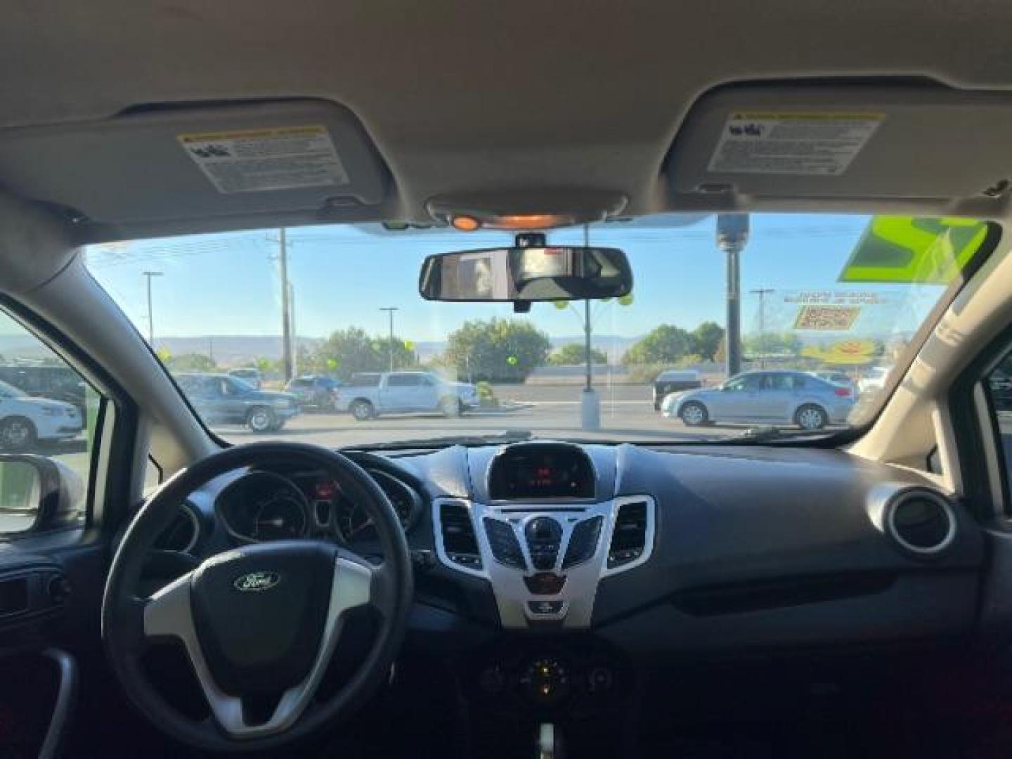 2012 Ingot Silver Metalli /Charcoal Black Cloth Ford Fiesta SE Sedan (3FADP4BJ2CM) with an 1.6L L4 DOHC 16V engine, 6-Speed Automatic transmission, located at 940 North Main Street, Cedar City, UT, 84720, (435) 628-0023, 37.692936, -113.061897 - Photo#23