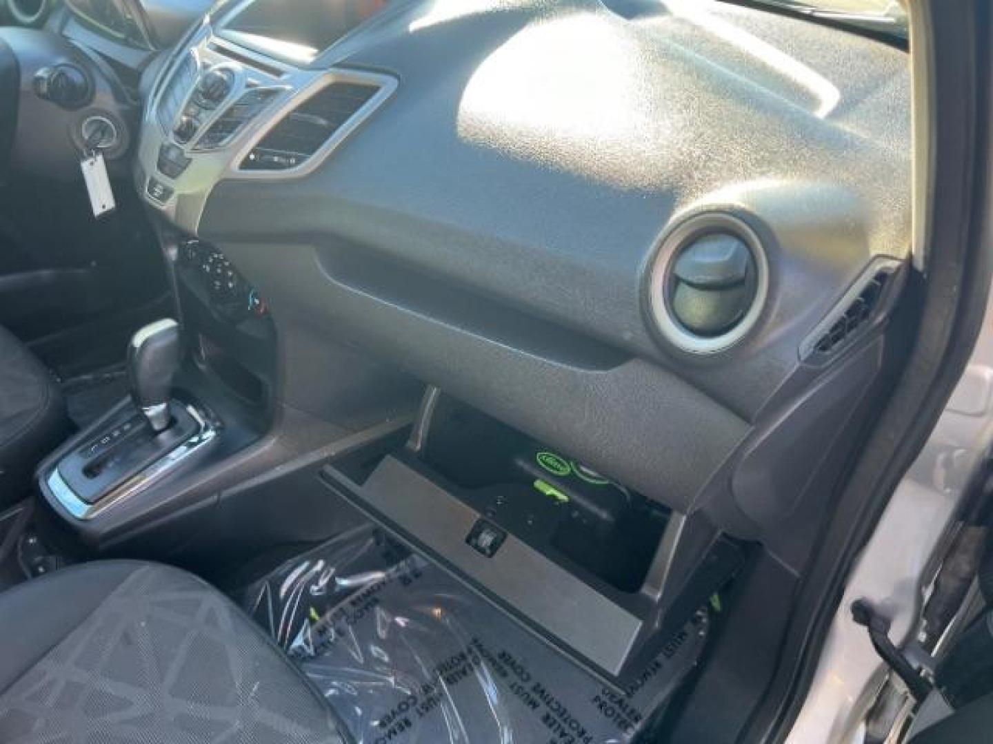 2012 Ingot Silver Metalli /Charcoal Black Cloth Ford Fiesta SE Sedan (3FADP4BJ2CM) with an 1.6L L4 DOHC 16V engine, 6-Speed Automatic transmission, located at 940 North Main Street, Cedar City, UT, 84720, (435) 628-0023, 37.692936, -113.061897 - Photo#29