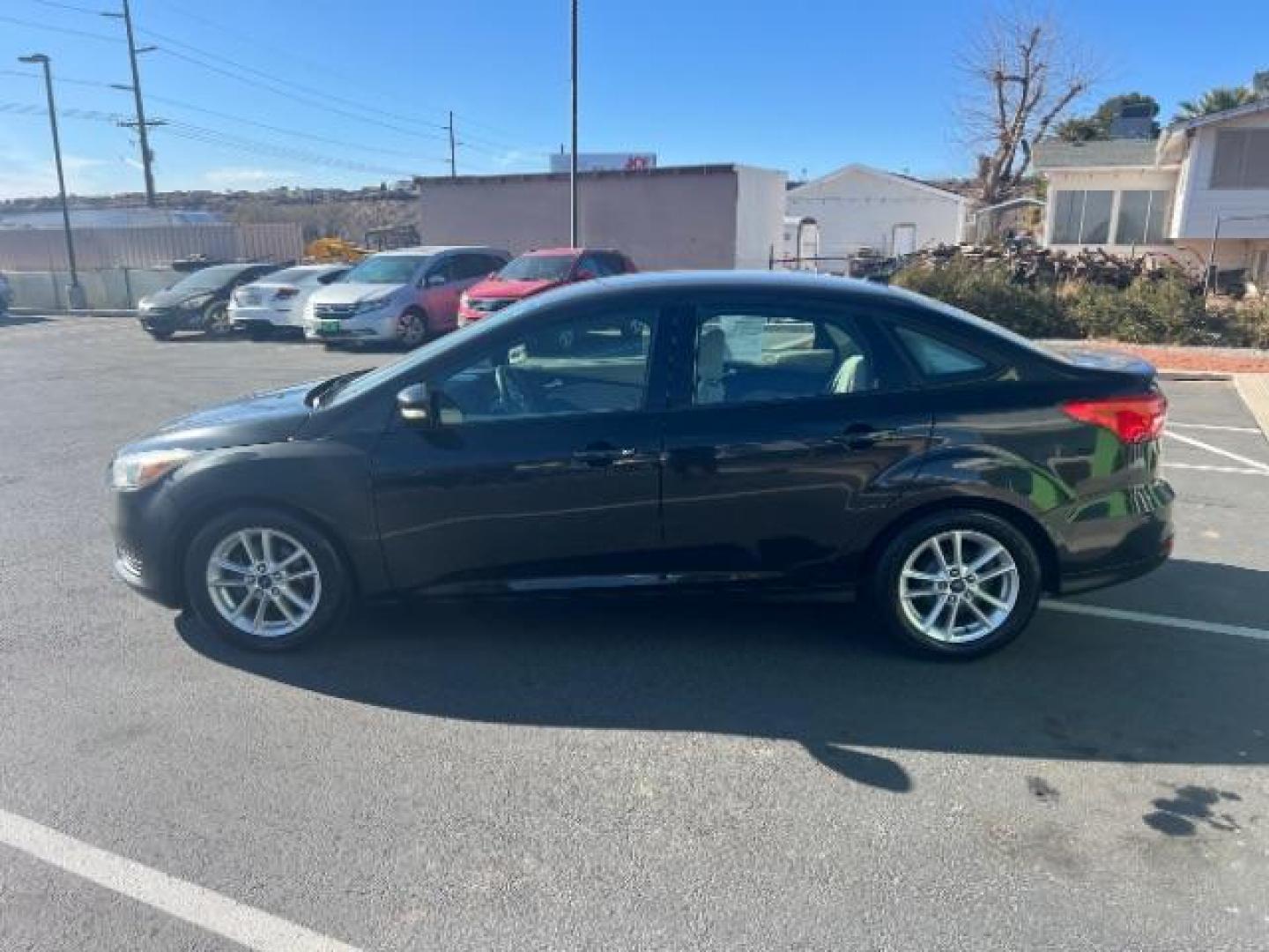 2015 Tuxedo Black Metalli /Charcoal Black Inser Ford Focus SE Sedan (1FADP3F21FL) with an 2.0L L4 DOHC 16V engine, 6-Speed Automatic transmission, located at 1865 East Red Hills Pkwy, St. George, 84770, (435) 628-0023, 37.120850, -113.543640 - Photo#3