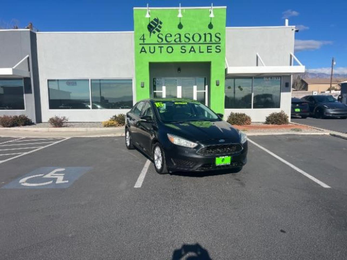 2015 Tuxedo Black Metalli /Charcoal Black Inser Ford Focus SE Sedan (1FADP3F21FL) with an 2.0L L4 DOHC 16V engine, 6-Speed Automatic transmission, located at 1865 East Red Hills Pkwy, St. George, 84770, (435) 628-0023, 37.120850, -113.543640 - Photo#0