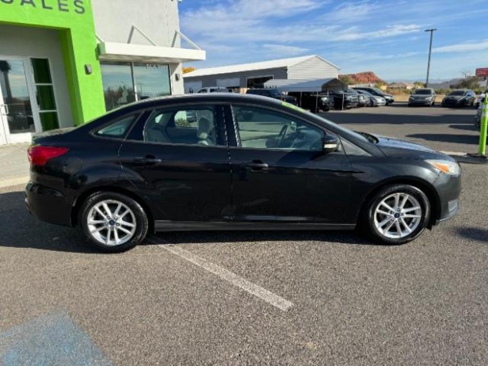 2015 Tuxedo Black Metallic /Charcoal Black Insert w/Warm Steel Surround, cloth Ford Focus SE Sedan (1FADP3F21FL) with an 2.0L L4 DOHC 16V engine, 6-Speed Automatic transmission, located at 1865 East Red Hills Pkwy, St. George, 84770, (435) 628-0023, 37.120850, -113.543640 - We specialize in helping ALL people get the best financing available. No matter your credit score, good, bad or none we can get you an amazing rate. Had a bankruptcy, divorce, or repossessions? We give you the green light to get your credit back on the road. Low down and affordable payments that fit - Photo #9