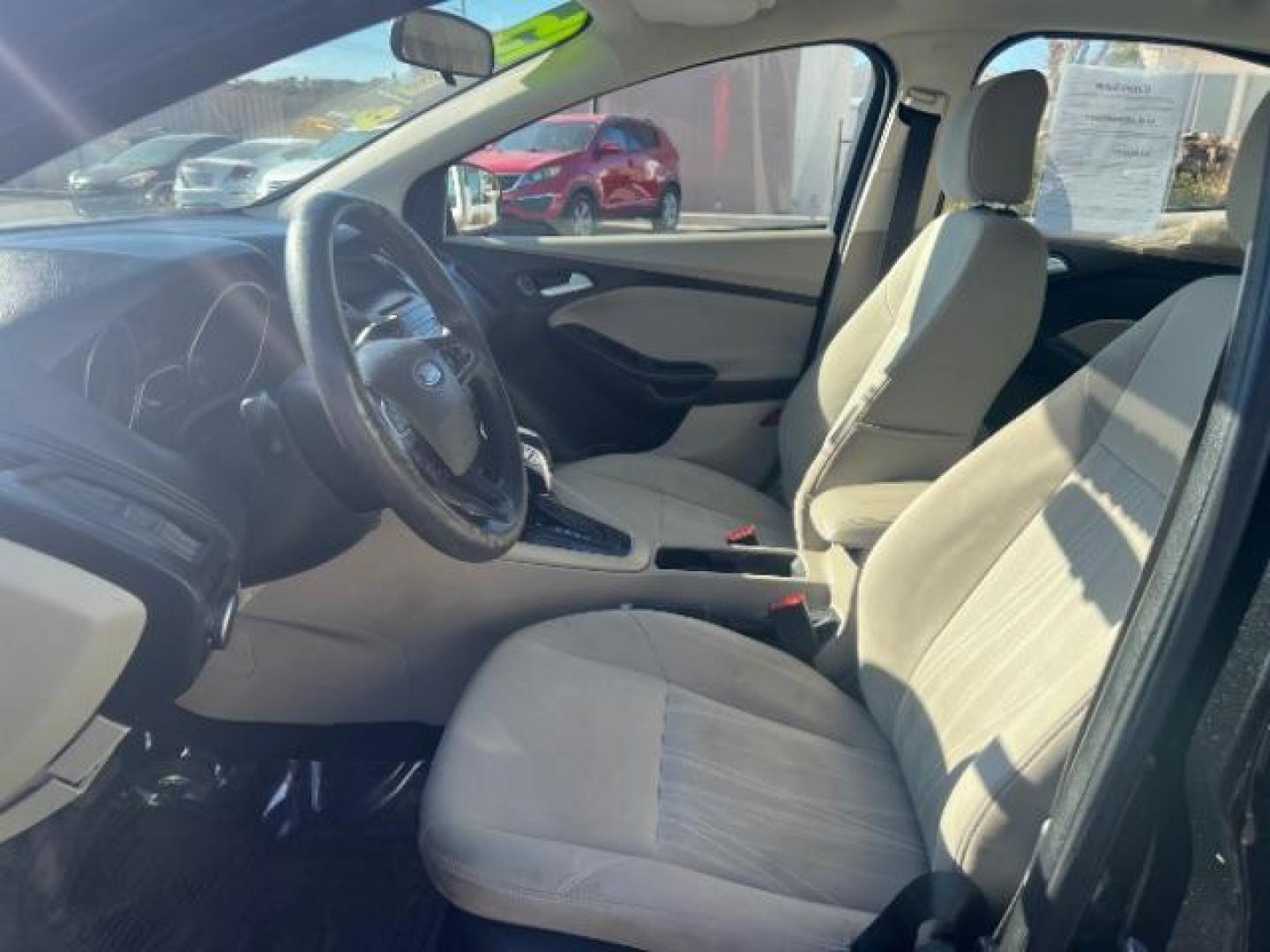 2015 Tuxedo Black Metalli /Charcoal Black Inser Ford Focus SE Sedan (1FADP3F21FL) with an 2.0L L4 DOHC 16V engine, 6-Speed Automatic transmission, located at 1865 East Red Hills Pkwy, St. George, 84770, (435) 628-0023, 37.120850, -113.543640 - Photo#12