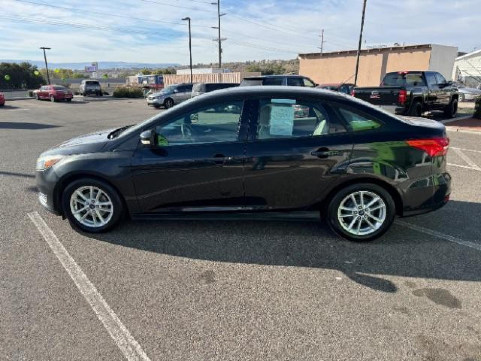 2015 Tuxedo Black Metalli /Charcoal Black Inser Ford Focus SE Sedan (1FADP3F21FL) with an 2.0L L4 DOHC 16V engine, 6-Speed Automatic transmission, located at 1865 East Red Hills Pkwy, St. George, 84770, (435) 628-0023, 37.120850, -113.543640 - We specialize in helping ALL people get the best financing available. No matter your credit score, good, bad or none we can get you an amazing rate. Had a bankruptcy, divorce, or repossessions? We give you the green light to get your credit back on the road. Low down and affordable payments that fit - Photo #5
