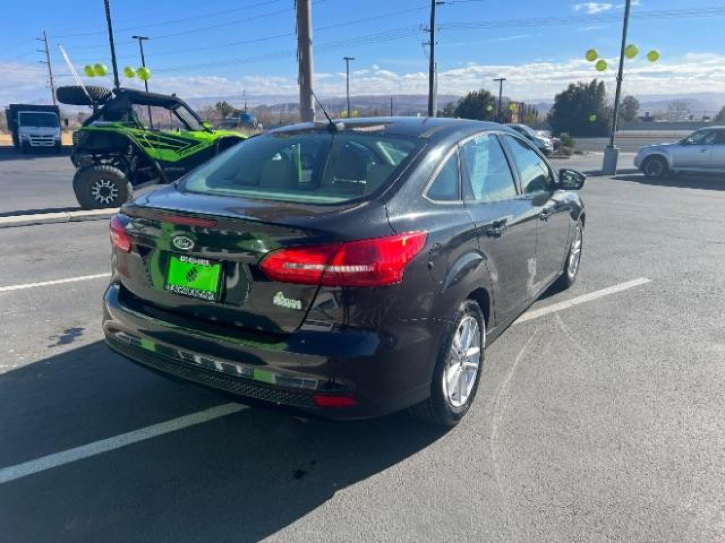 2015 Tuxedo Black Metalli /Charcoal Black Inser Ford Focus SE Sedan (1FADP3F21FL) with an 2.0L L4 DOHC 16V engine, 6-Speed Automatic transmission, located at 1865 East Red Hills Pkwy, St. George, 84770, (435) 628-0023, 37.120850, -113.543640 - Photo#6